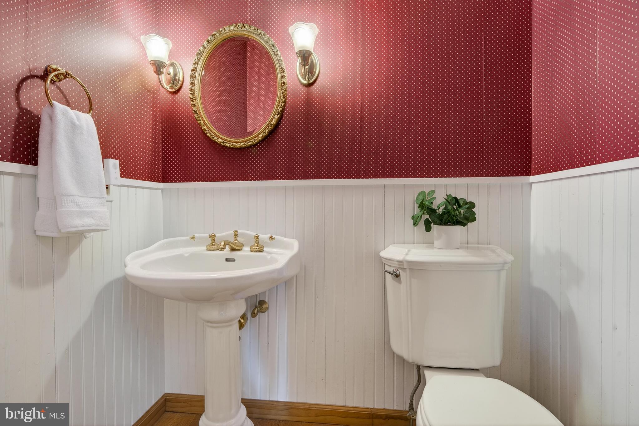 52 Atwater Road Chadds Ford, PA 19317 - Photo 28 of 85 a bathroom with a toilet sink and mirror