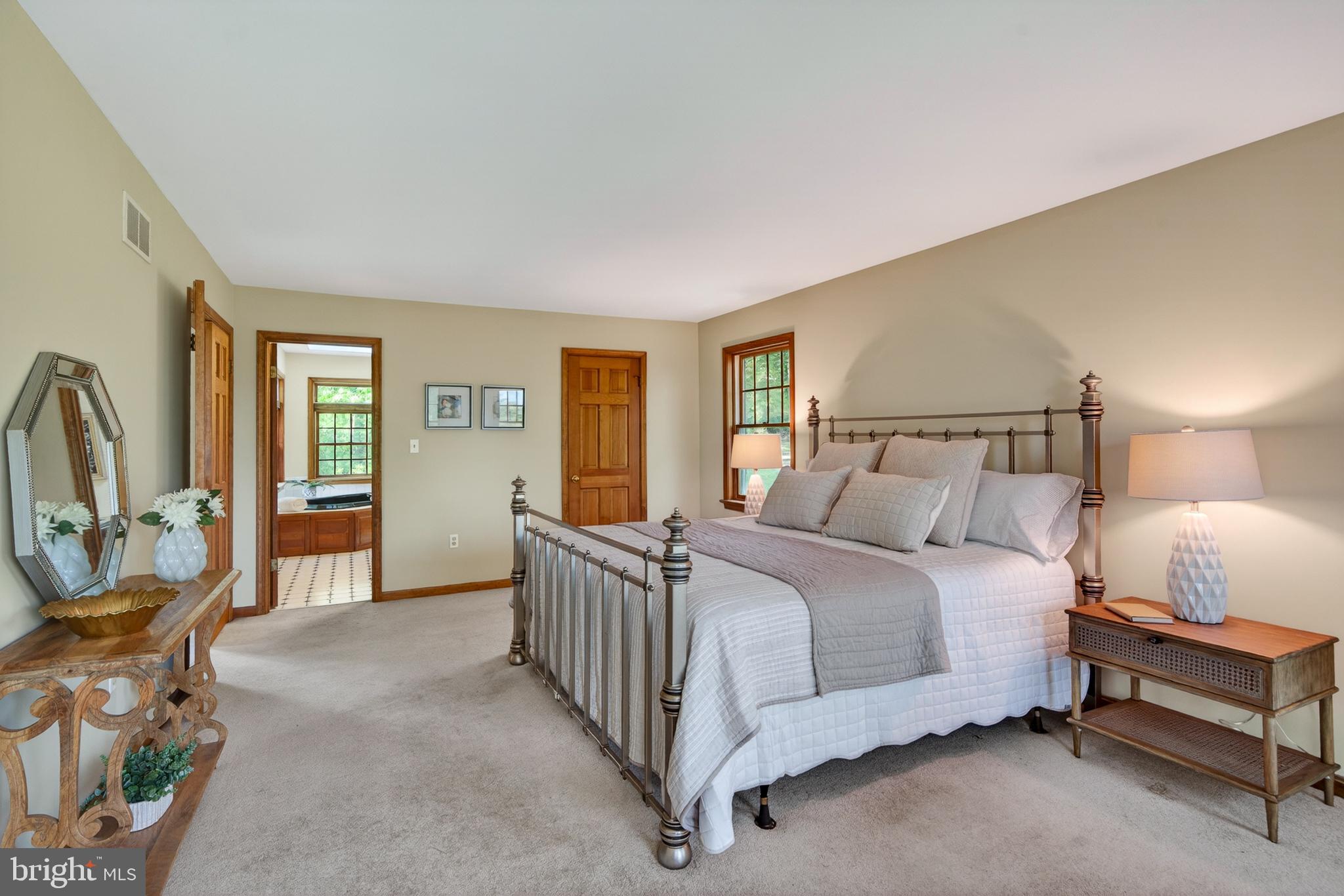 52 Atwater Road Chadds Ford, PA 19317 - Photo 32 of 85 a bed room with a bed and a chair