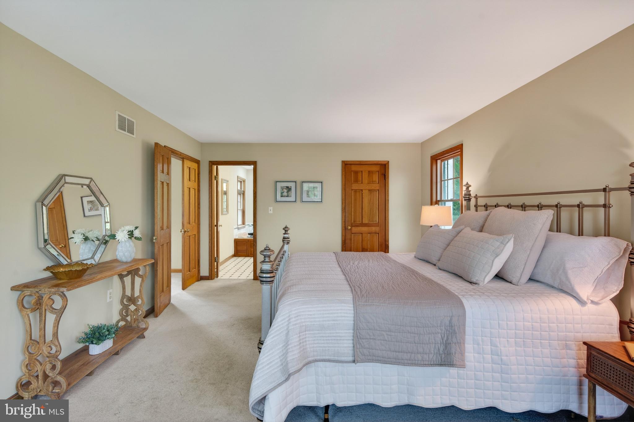 52 Atwater Road Chadds Ford, PA 19317 - Photo 33 of 85 a bedroom with a bed a window and dresser