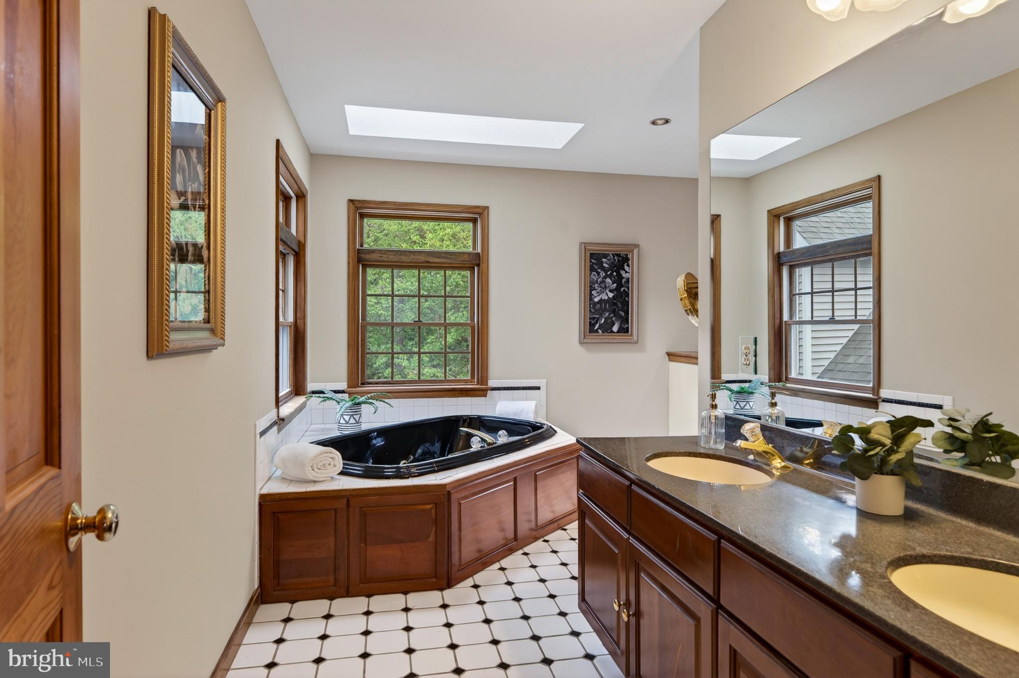 52 Atwater Road Chadds Ford, PA 19317 - Photo 34 of 85 a kitchen with a sink a stove cabinets and a window