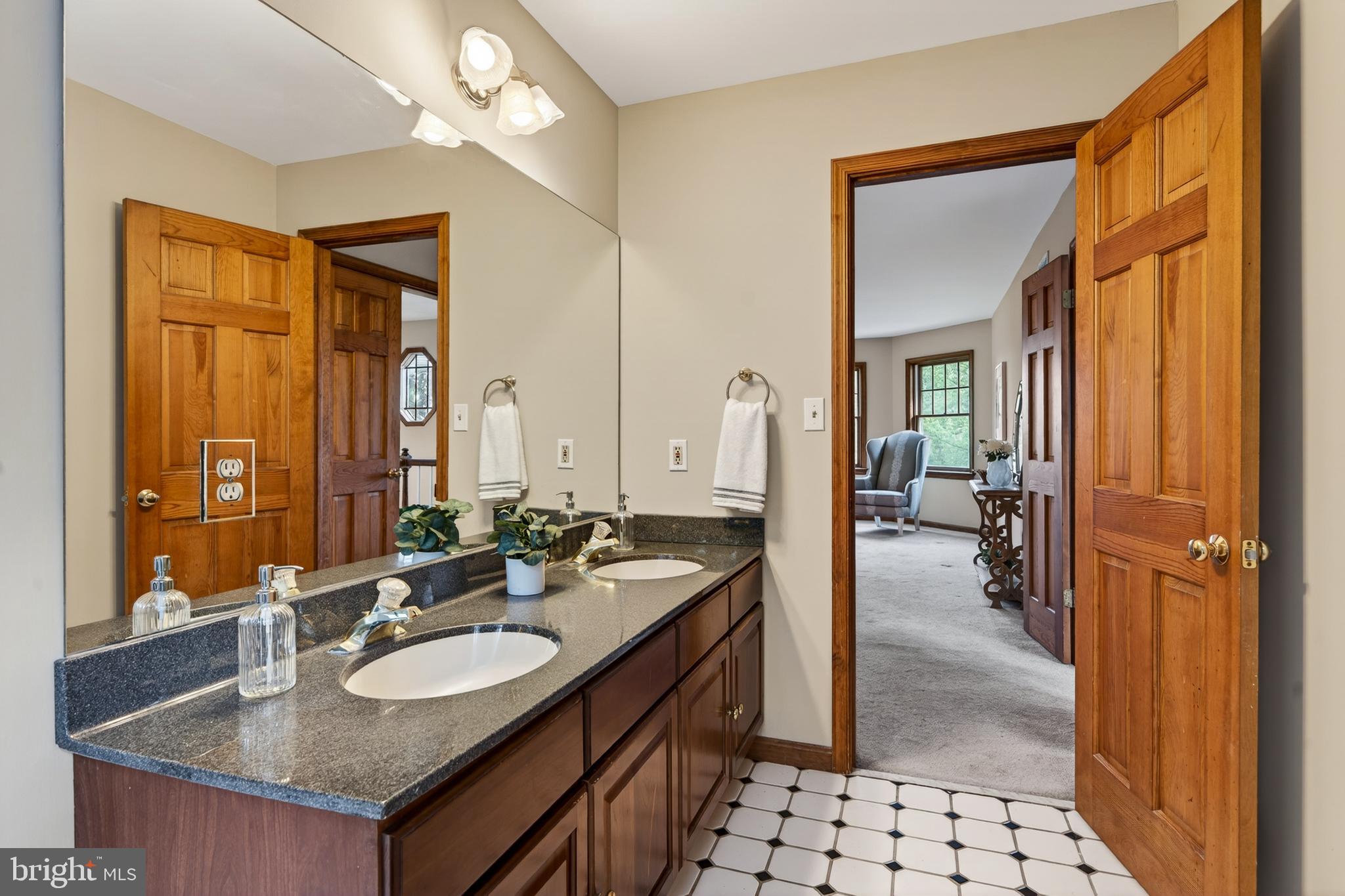 52 Atwater Road Chadds Ford, PA 19317 - Photo 38 of 85 a en suite bathroom with a granite countertop sink and a mirror