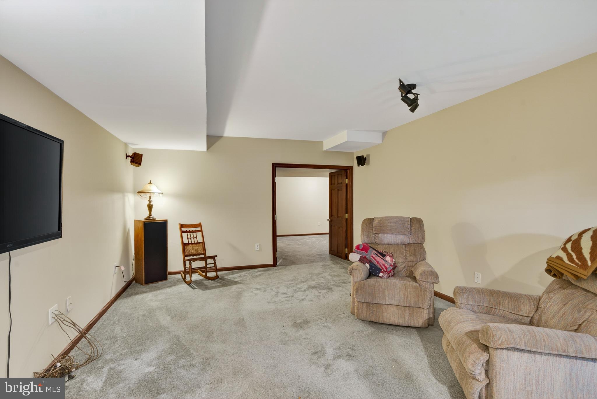 52 Atwater Road Chadds Ford, PA 19317 - Photo 56 of 85 a living room with furniture and a flat screen tv