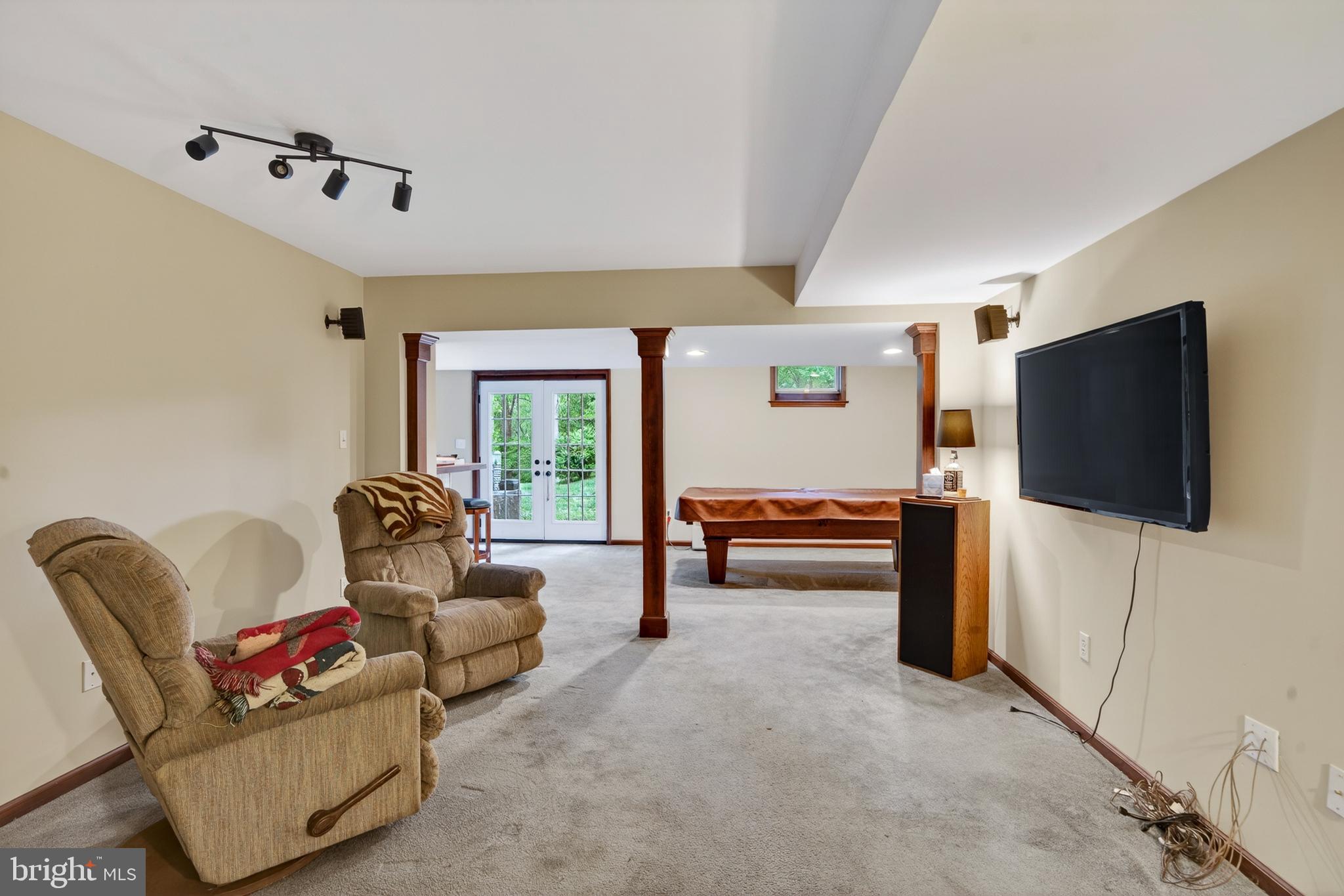 52 Atwater Road Chadds Ford, PA 19317 - Photo 57 of 85 a living room with furniture and a flat screen tv