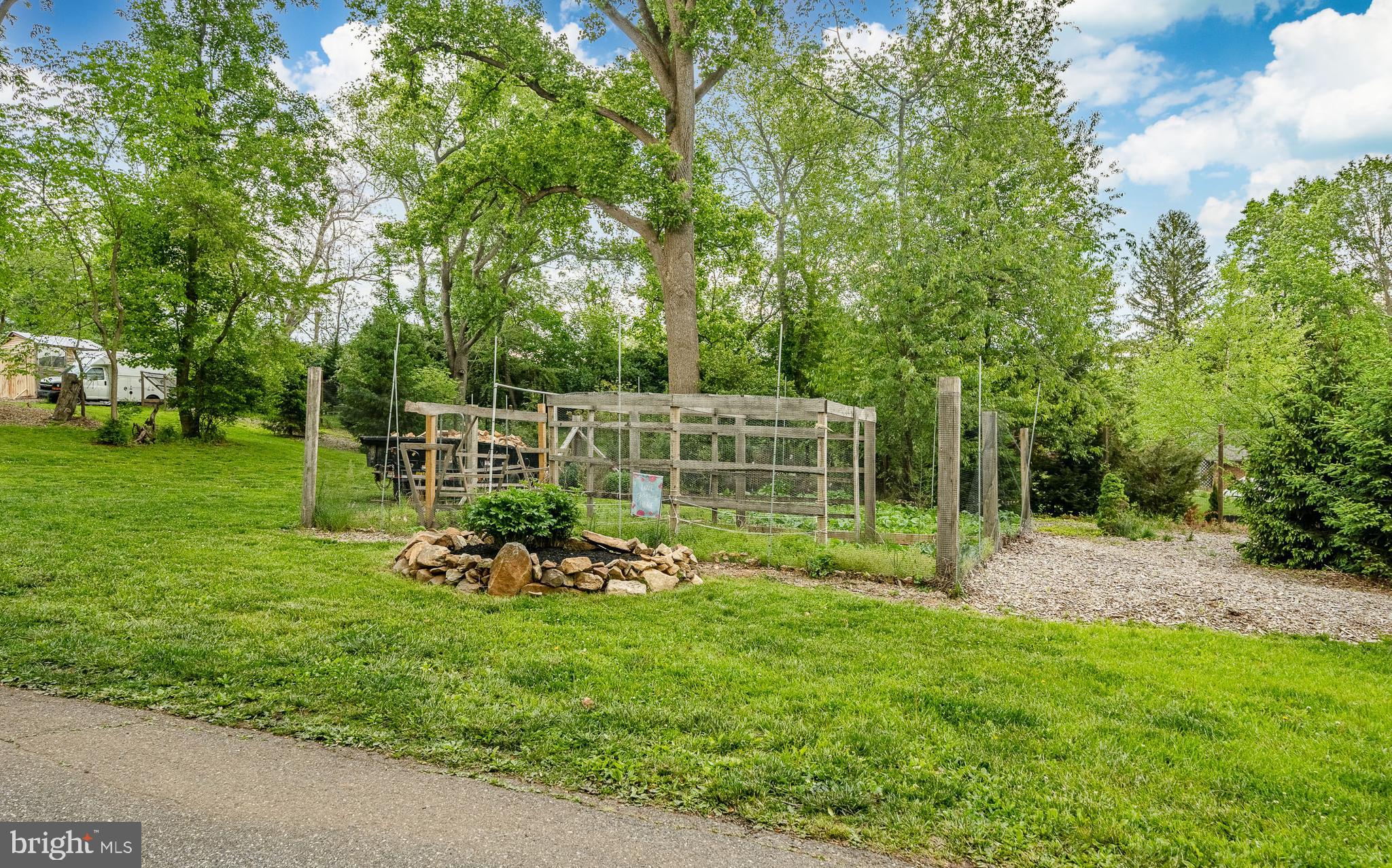 52 Atwater Road Chadds Ford, PA 19317 - Photo 59 of 85 a view of a chair and table in the garden