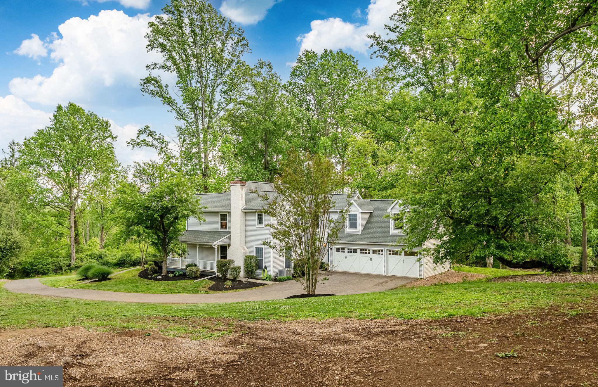 52 Atwater Road Chadds Ford, PA 19317 - Photo 67 of 85 a view of a big house with a big yard and large trees