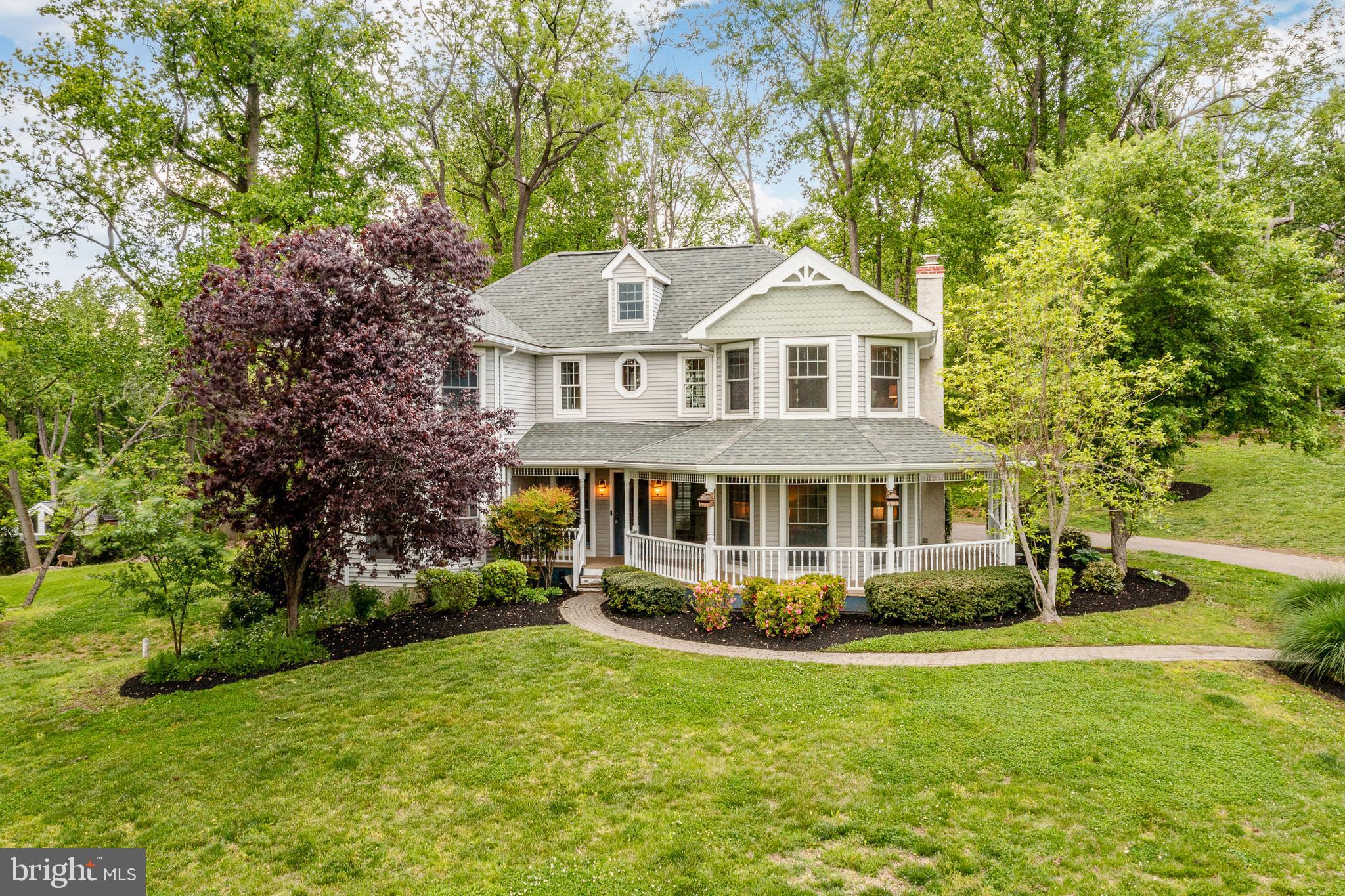 52 Atwater Road Chadds Ford, PA 19317 - Photo 69 of 85 a front view of a house with a yard and trees