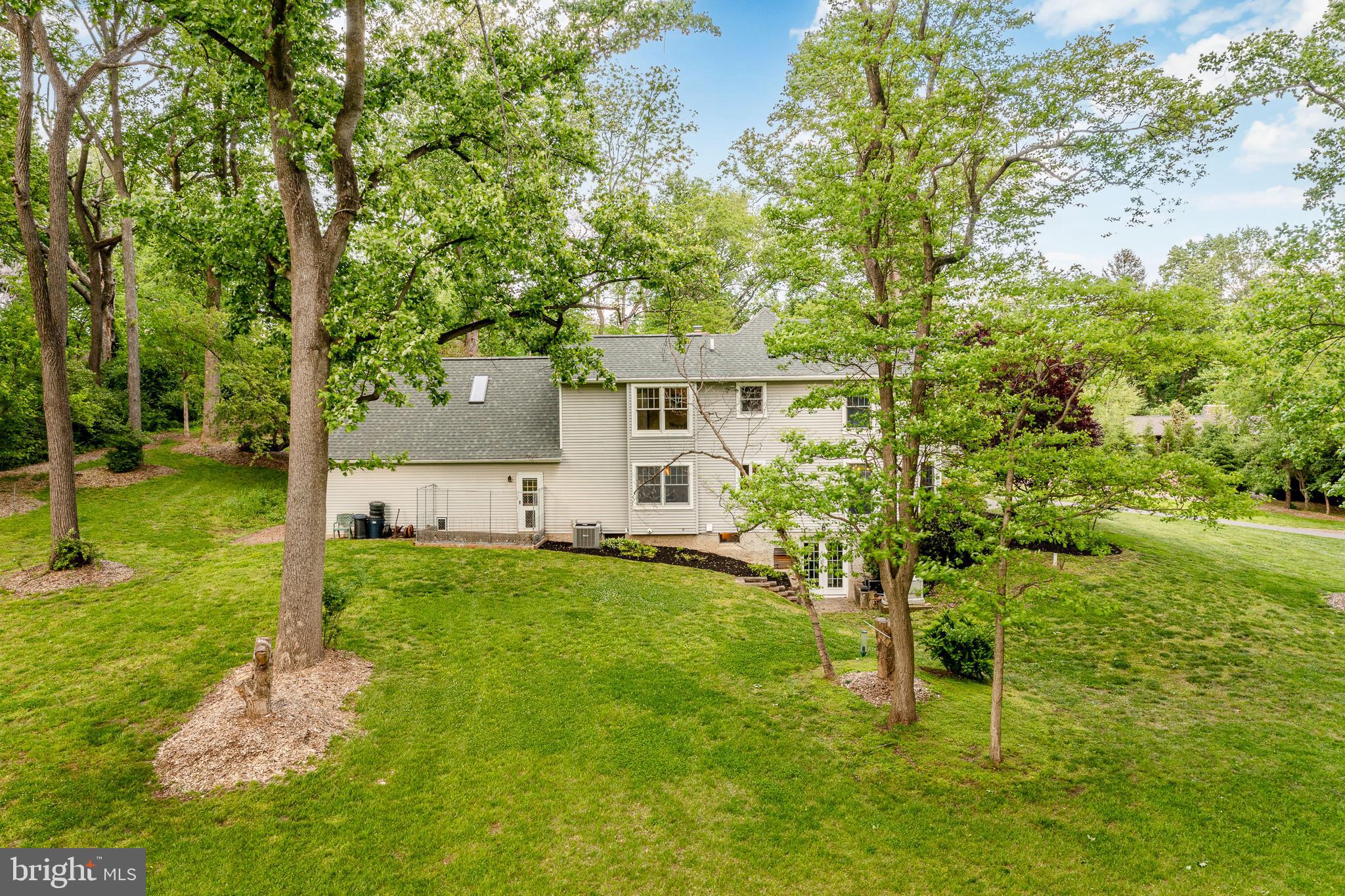 52 Atwater Road Chadds Ford, PA 19317 - Photo 84 of 85 a backyard of a house with table and chairs