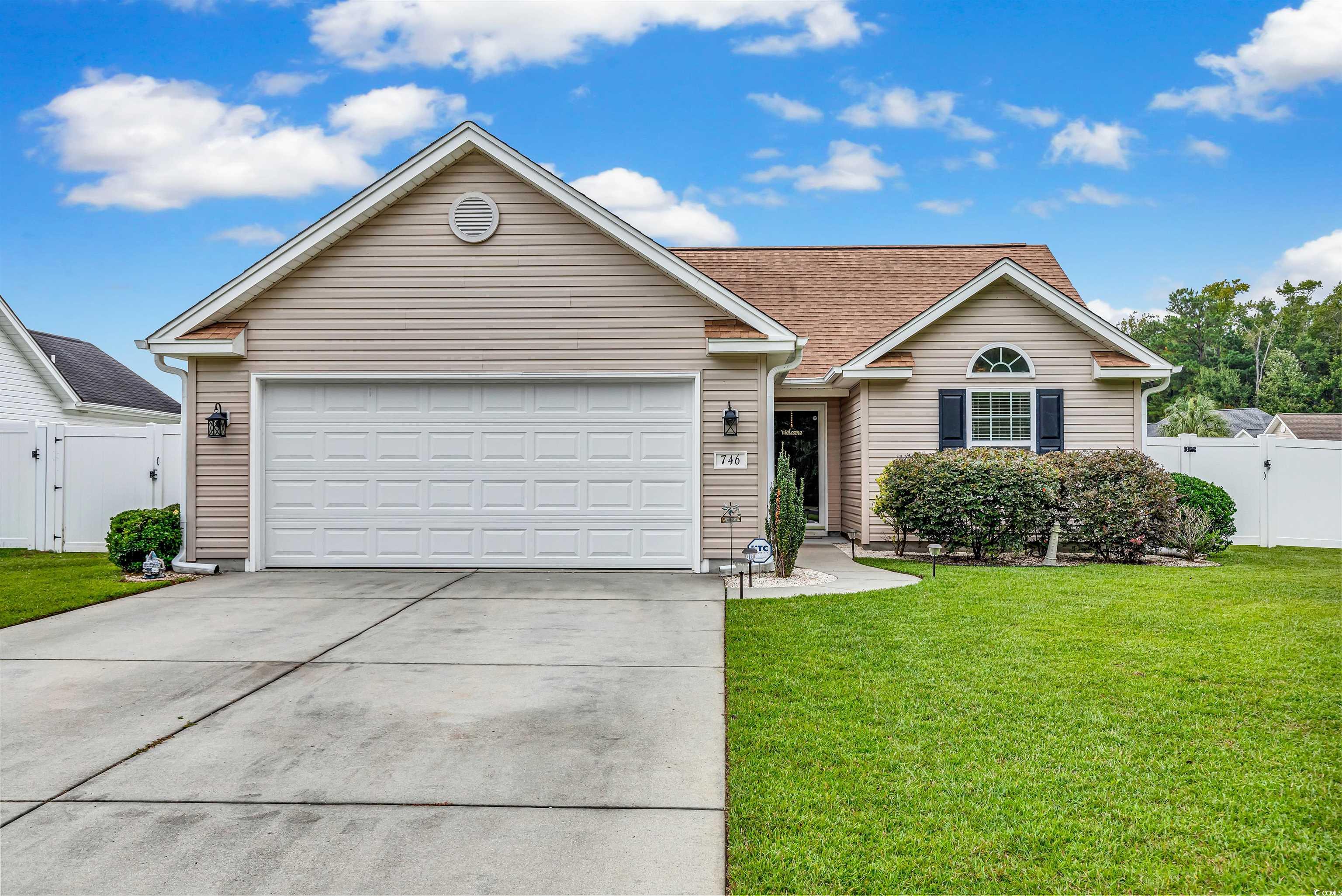 746 Bucklin Loop Myrtle Beach, SC 29579 - Photo 1 of 39 Ranch-style home featuring a front lawn and a gara