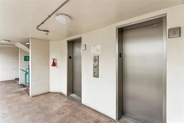 a view of a livingroom with a white walls