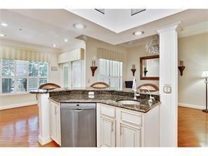 3777 Peachtree Road Northeast, Unit 433 Brookhaven, GA 30319 - Photo 1 of 1 a kitchen with stainless steel appliances granite countertop a sink stove and cabinets