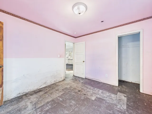 a bathroom with a bathtub and shower