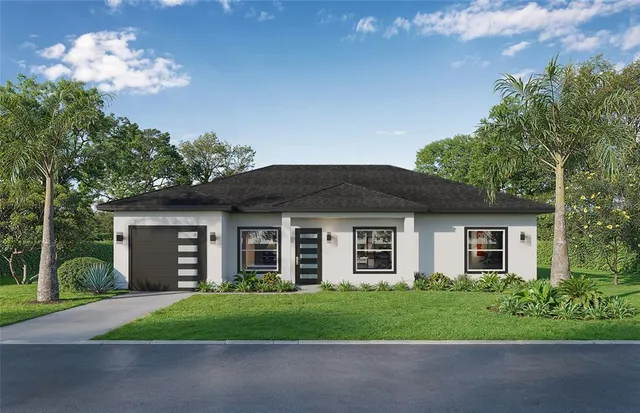 a view of a house with a yard