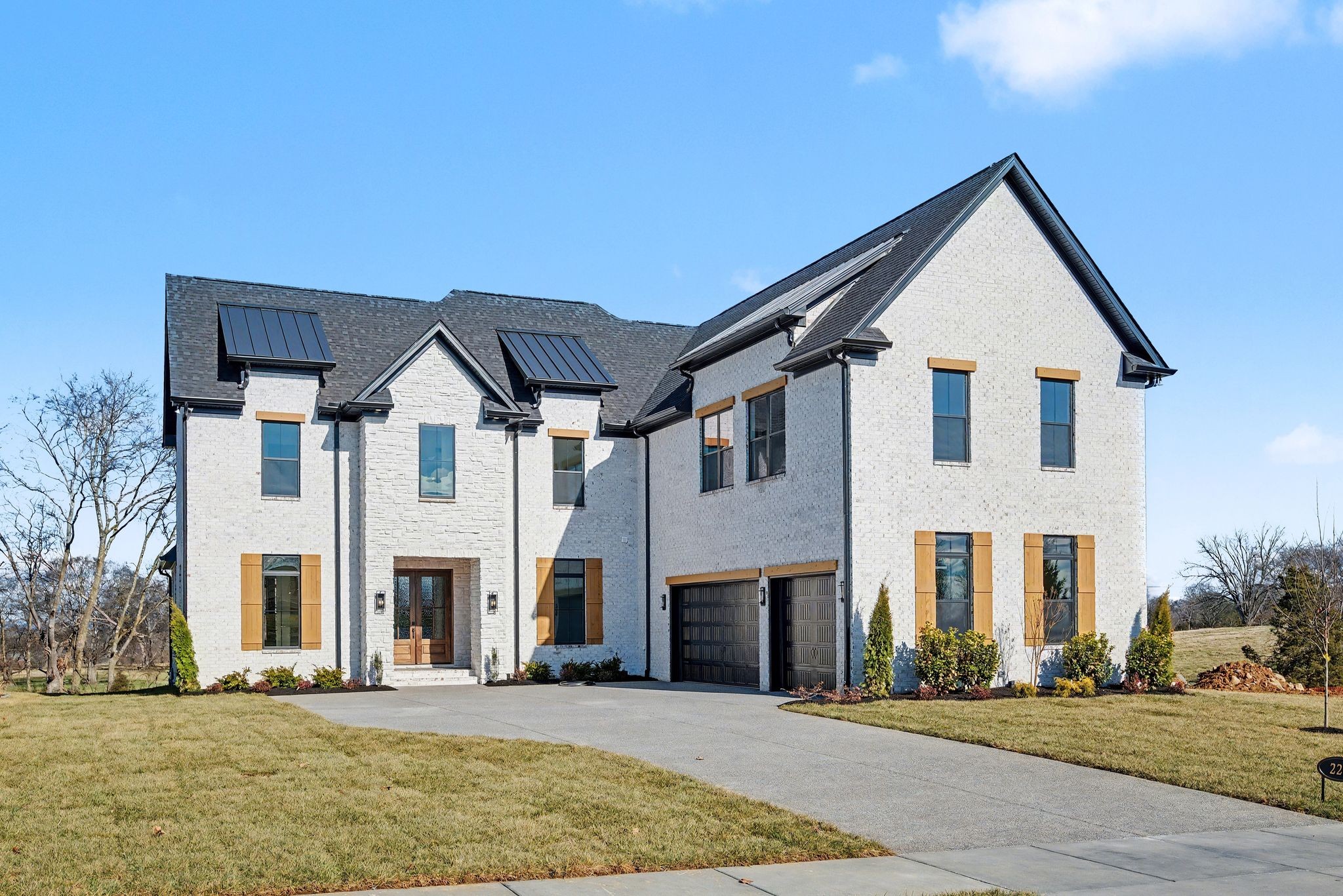 225 Bellsford Road Gallatin, TN 37066 - Photo 2 of 55 a front view of a house with a yard
