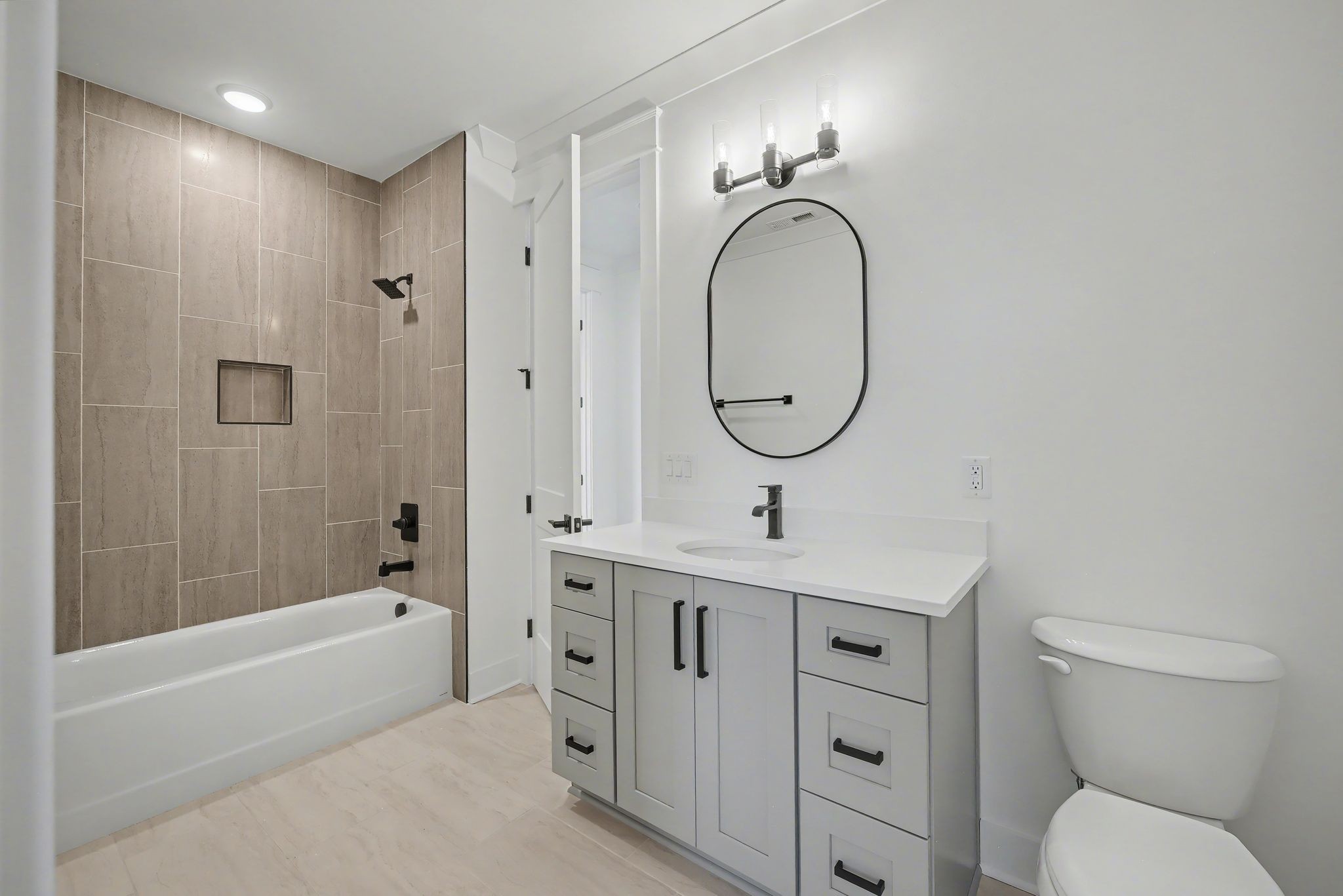 225 Bellsford Road Gallatin, TN 37066 - Photo 47 of 55 a bathroom with a toilet sink shower and mirror