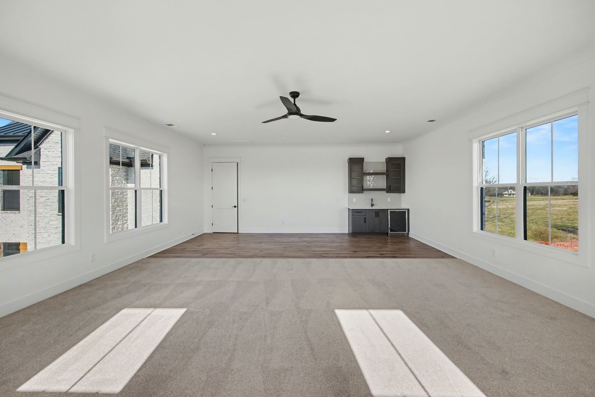 225 Bellsford Road Gallatin, TN 37066 - Photo 50 of 55 a view of an empty room with a window and a kitchen