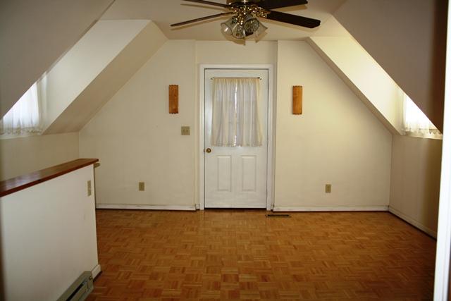2372 Jarrell Ridge Road Clarksville, TN 37043 - Photo 11 of 18 The first upstairs bedroom with lovely dormer windows. That door opens to a private deck!