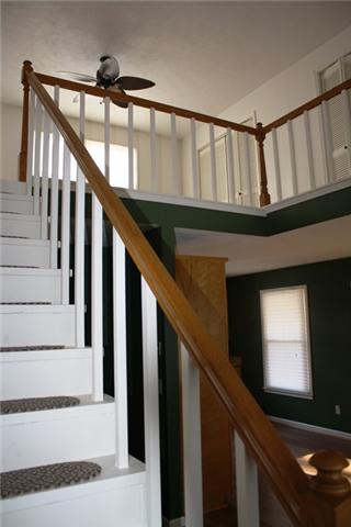 2372 Jarrell Ridge Road Clarksville, TN 37043 - Photo 13 of 18 Up the stairs we go to the loft bedroom! This house is so charming!