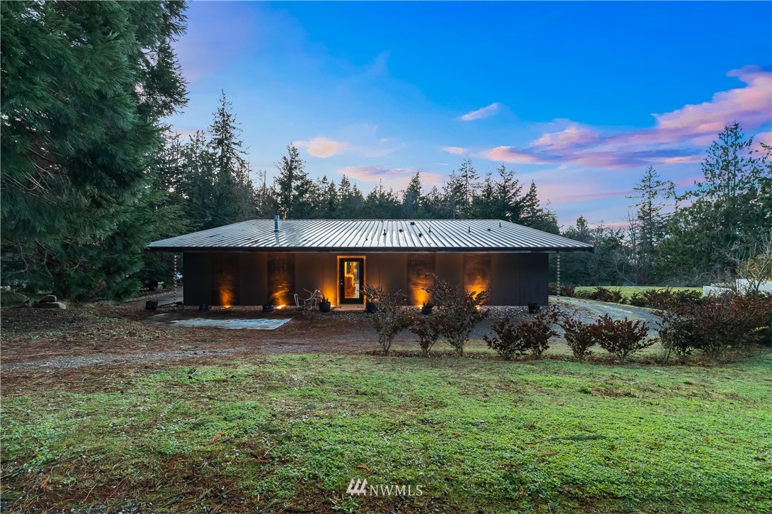 128 Hiline Road Bellingham, WA 98229 - Photo 1 of 27 a view of a barn in the middle of a yard