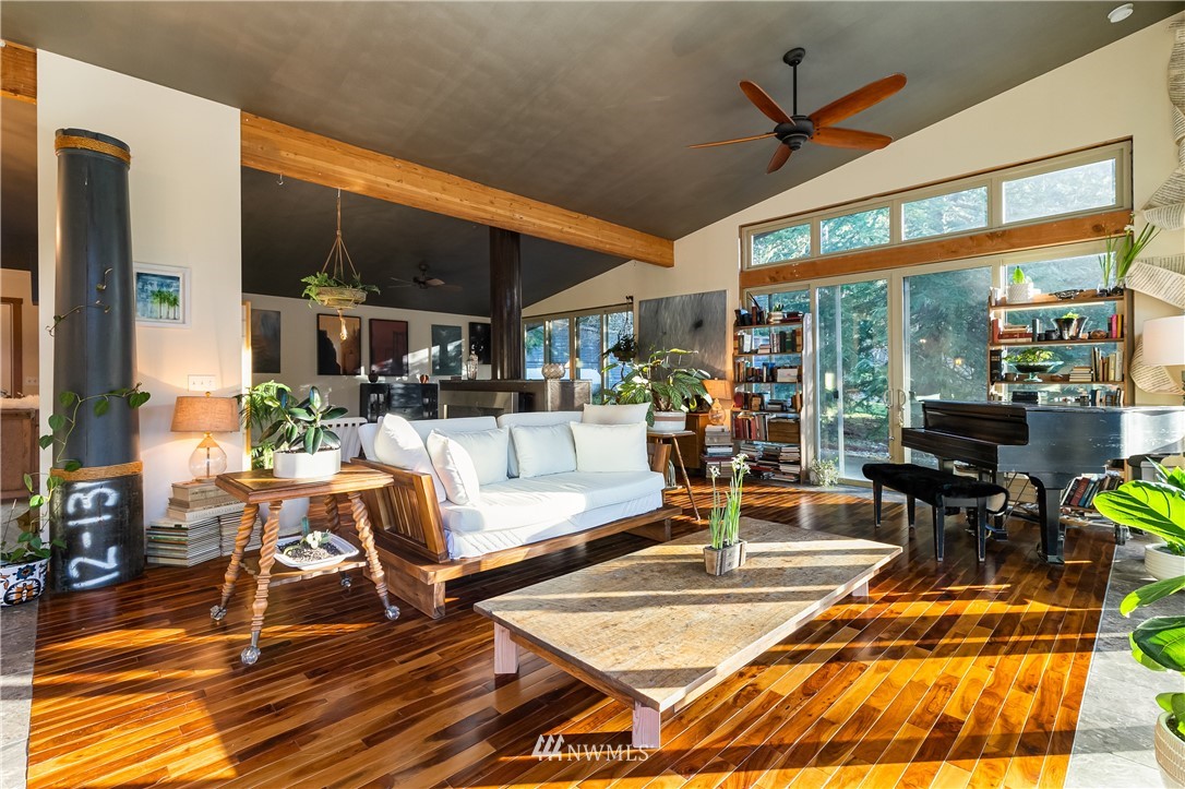 128 Hiline Road Bellingham, WA 98229 - Photo 14 of 27 a living room with patio furniture and a floor to ceiling window
