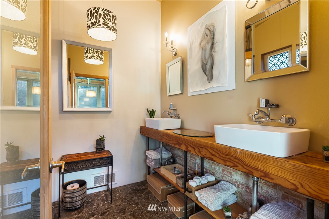 128 Hiline Road Bellingham, WA 98229 - Photo 22 of 27 a bathroom with a sink mirror and vanity