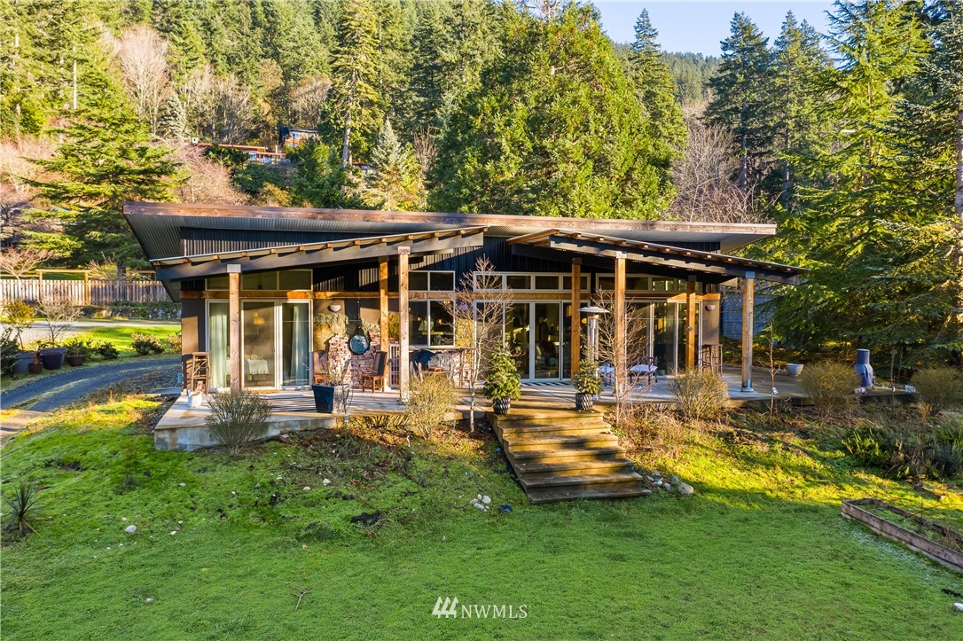 128 Hiline Road Bellingham, WA 98229 - Photo 25 of 27 a view of a house with backyard porch and sitting area
