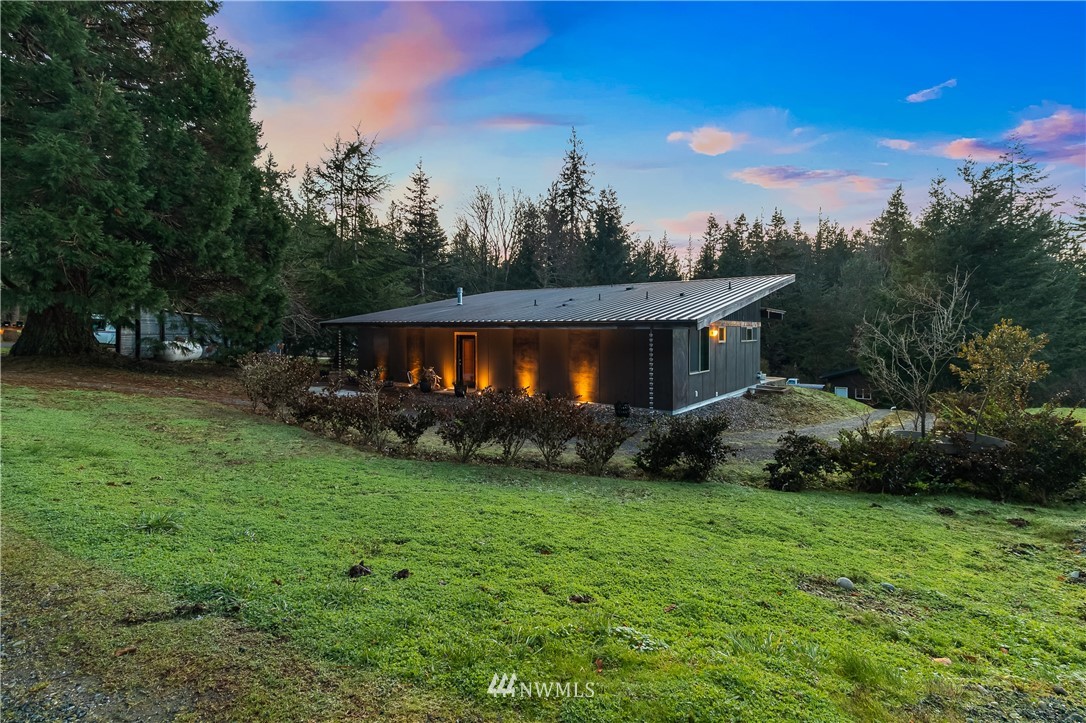 128 Hiline Road Bellingham, WA 98229 - Photo 27 of 27 a view of a house with a yard and sitting area