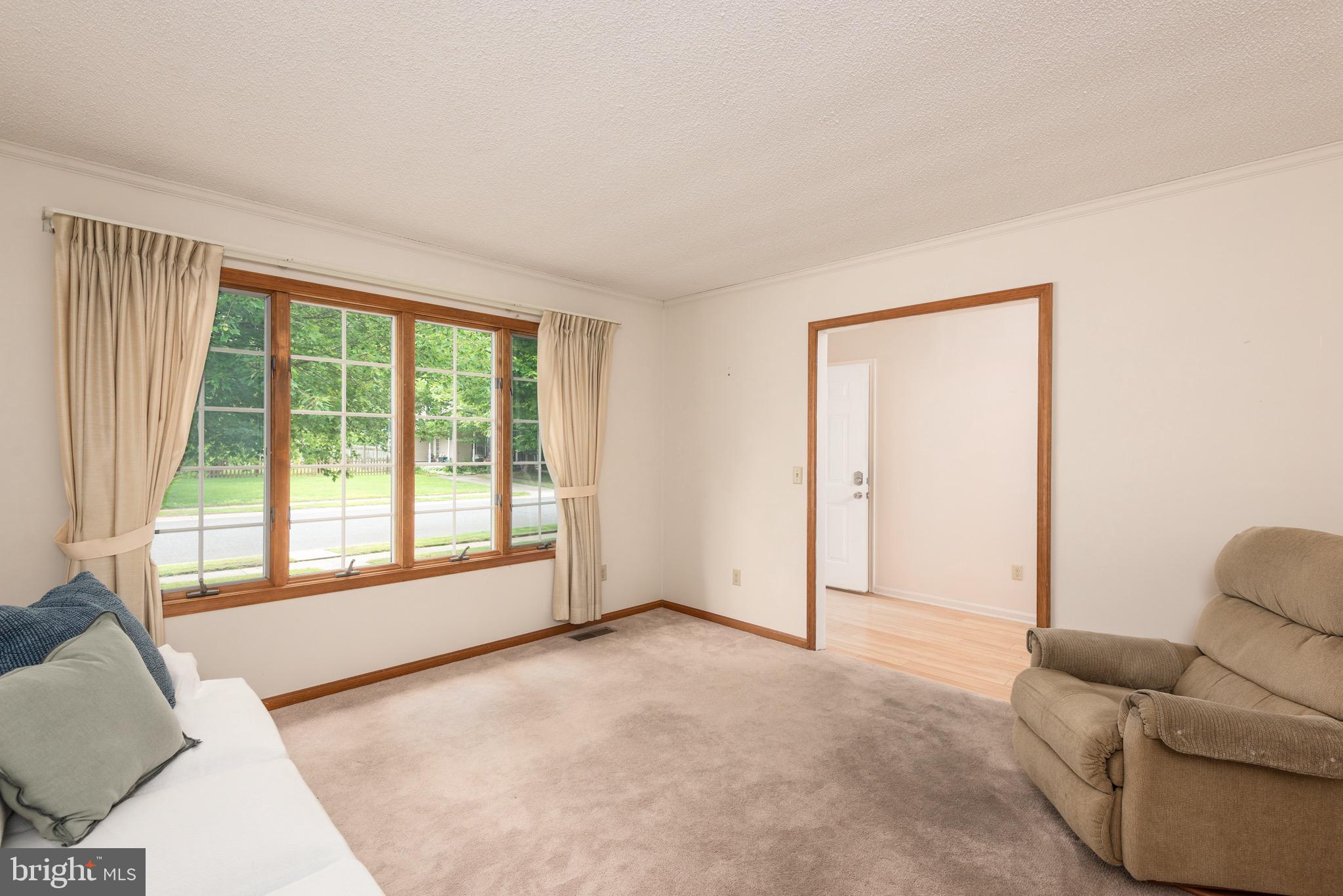 301 Spring Drive Easton, MD 21601 - Photo 19 of 32 a view of livingroom with furniture and window