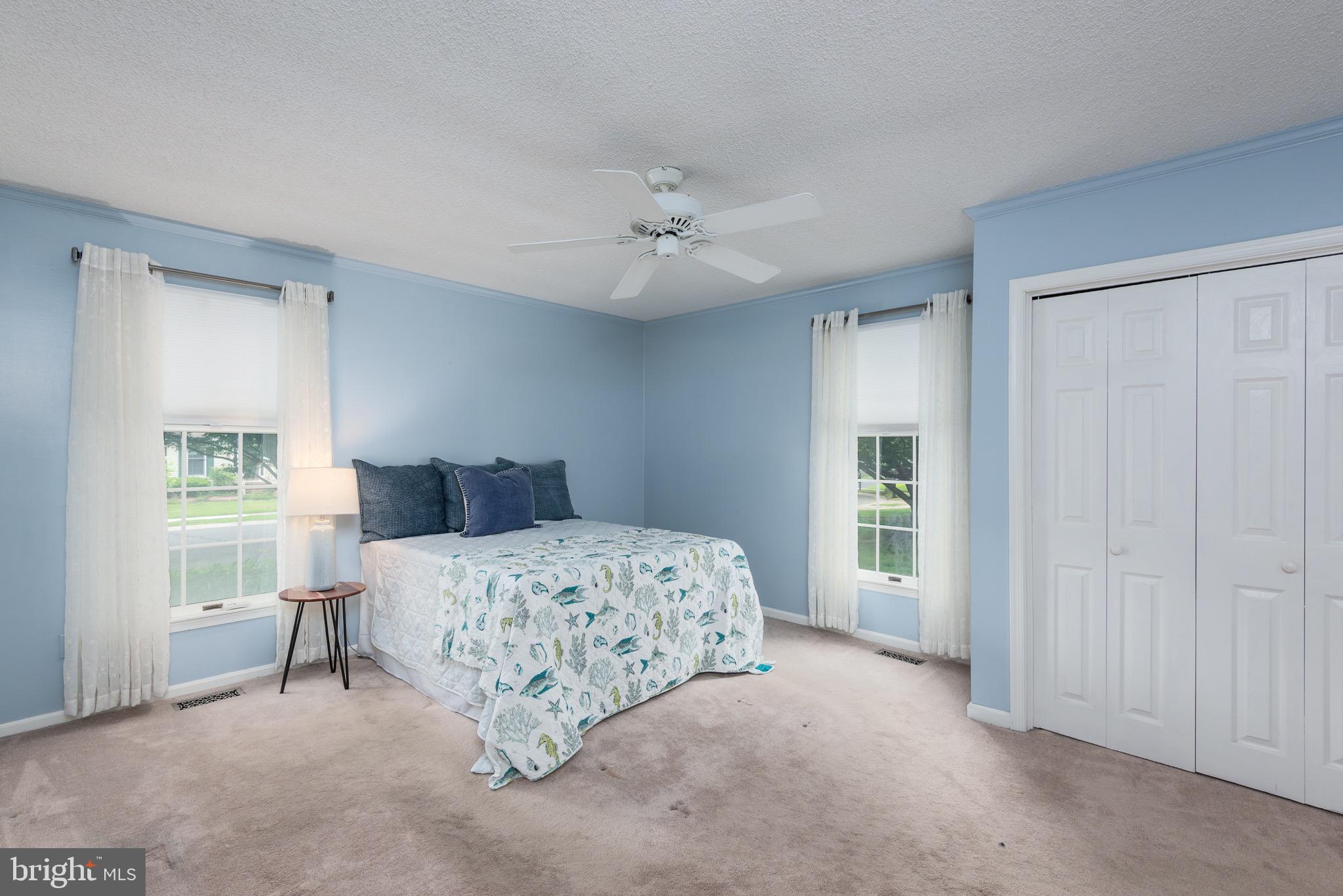 301 Spring Drive Easton, MD 21601 - Photo 22 of 32 a bedroom with a bed and a window