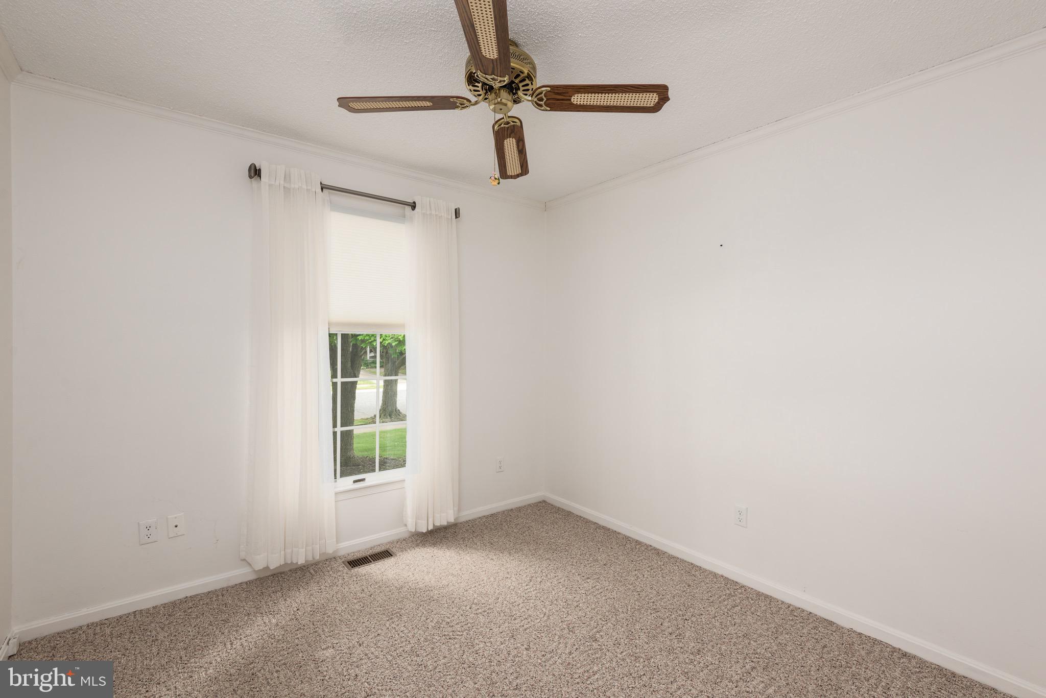 301 Spring Drive Easton, MD 21601 - Photo 27 of 32 a view of an empty room with a window