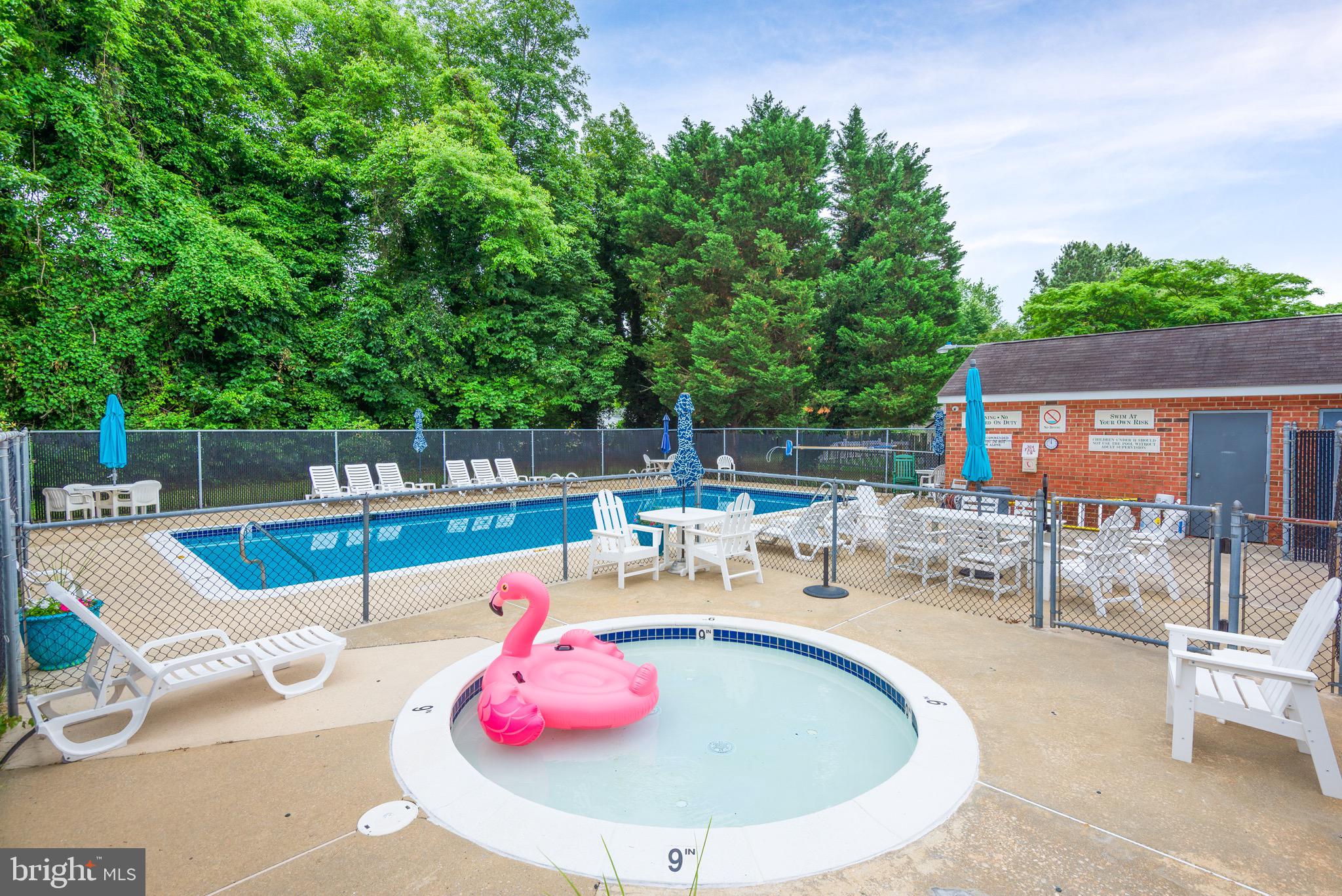 301 Spring Drive Easton, MD 21601 - Photo 32 of 32 a view of a swimming pool with a patio