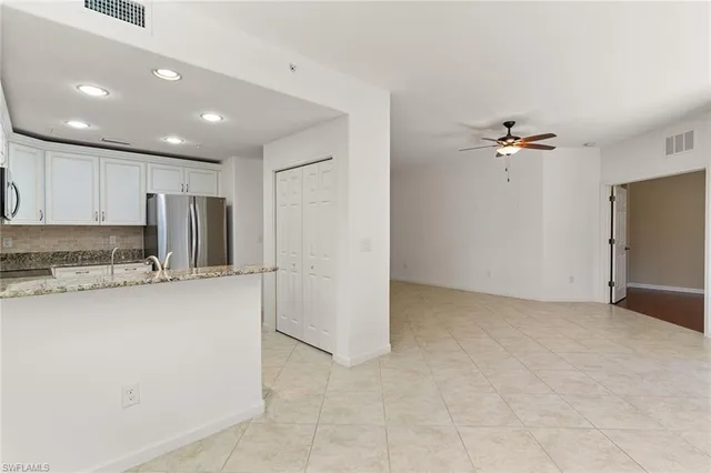 a view of a kitchen with a sink