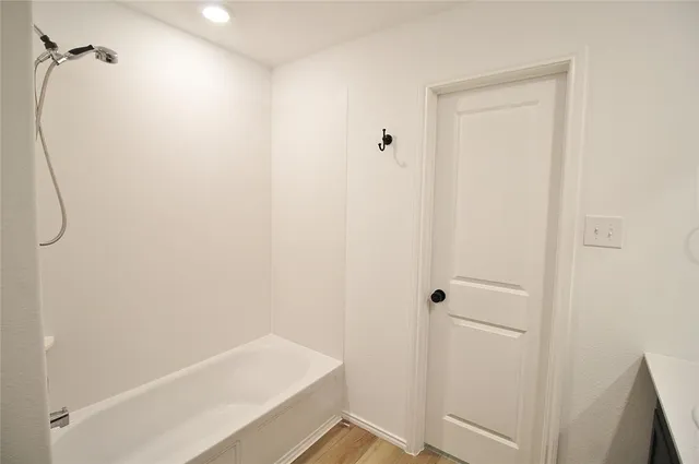a bathroom with a bathtub