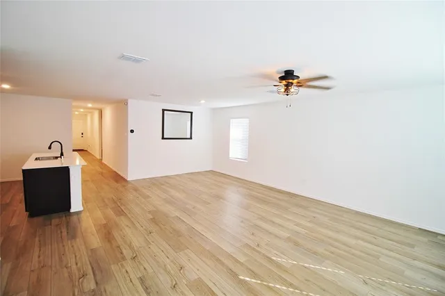a view of a livingroom with wooden floor