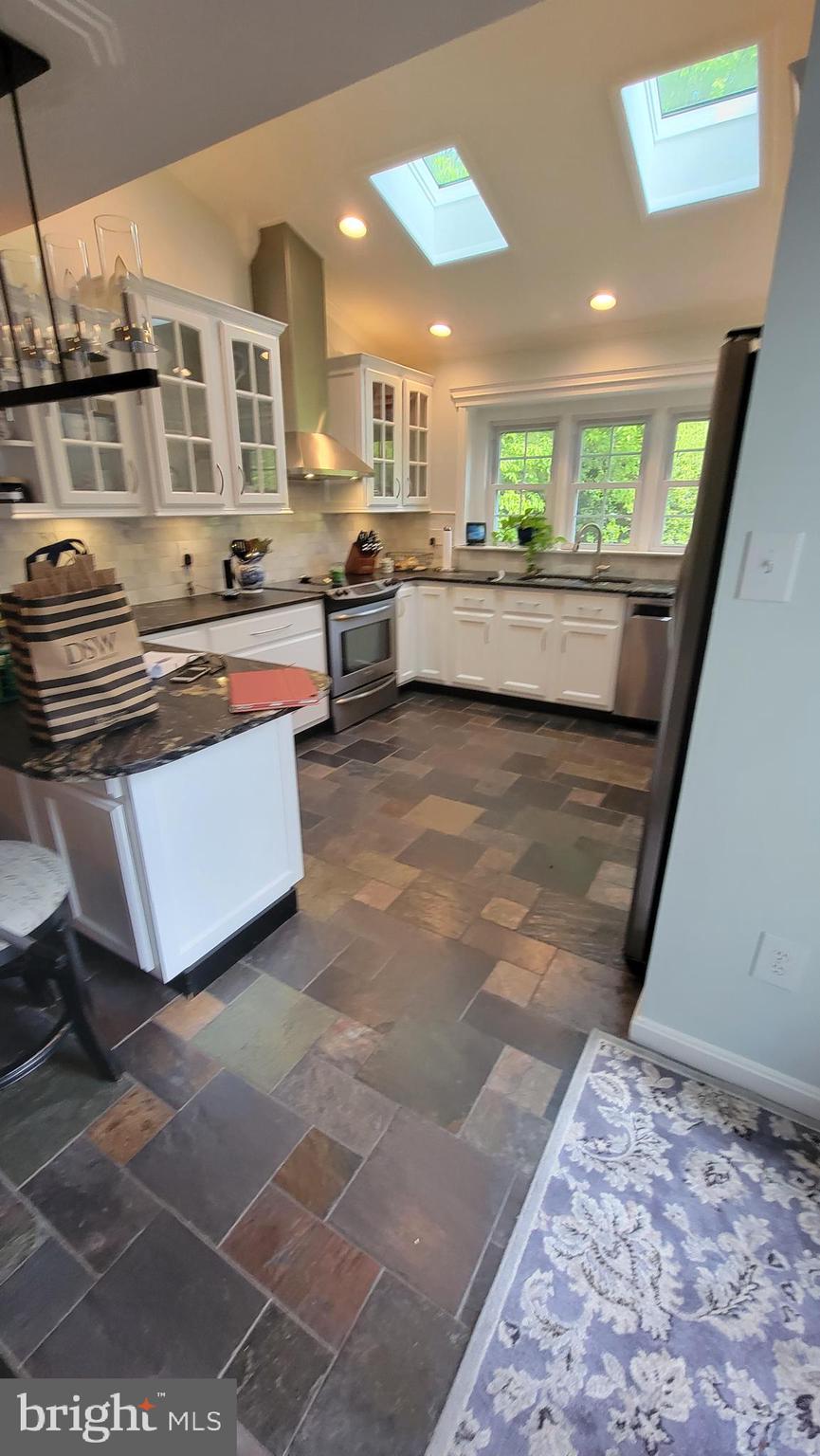 6591 Forsythia Street Springfield, VA 22150 - Photo 30 of 92 6591 Forsythia St Kitchen Skylights