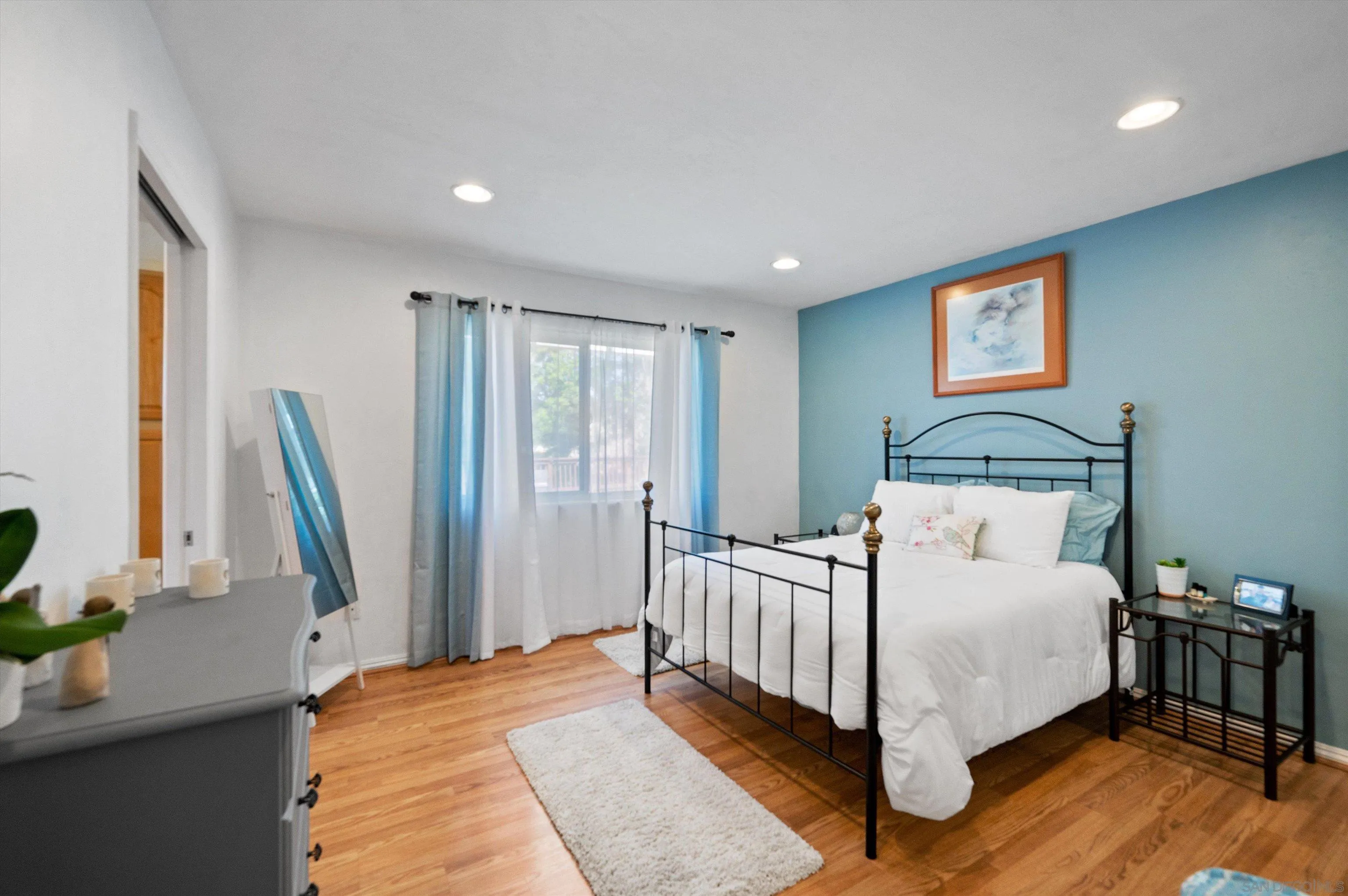 2537 Buena Rosa Fallbrook, CA 92028 - Photo 14 of 20 a bedroom with a bed next to a window