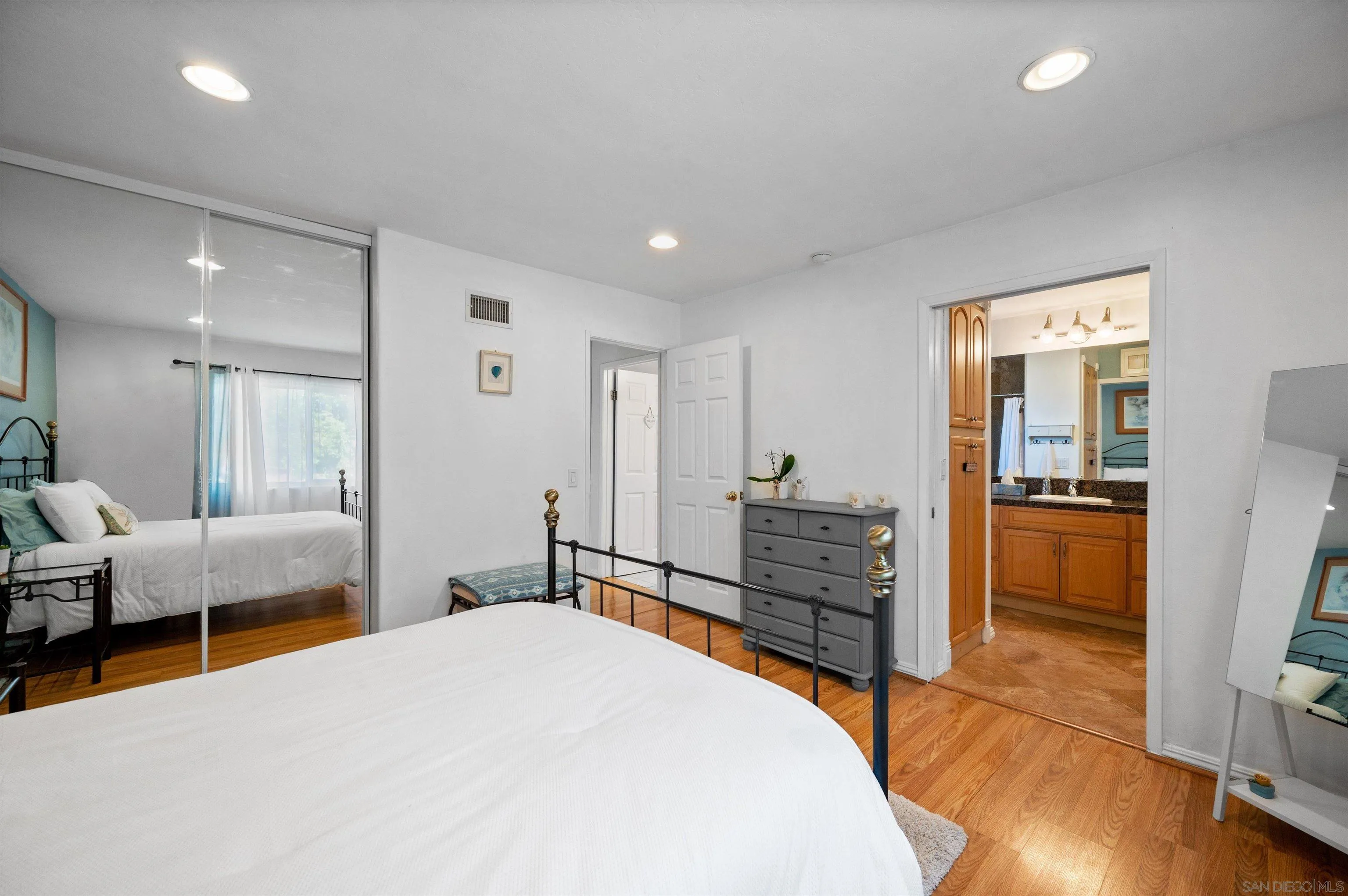 2537 Buena Rosa Fallbrook, CA 92028 - Photo 15 of 20 a bedroom with a bed and wooden floor