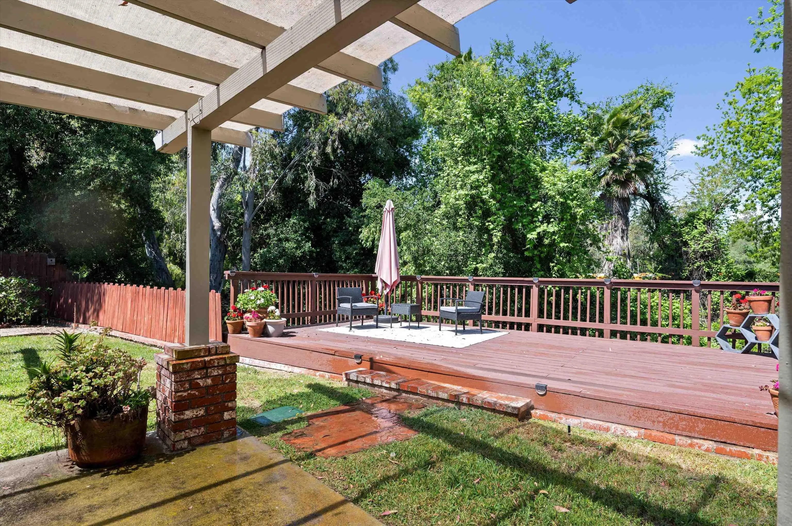 2537 Buena Rosa Fallbrook, CA 92028 - Photo 20 of 20 a balcony with chairs and wooden fence