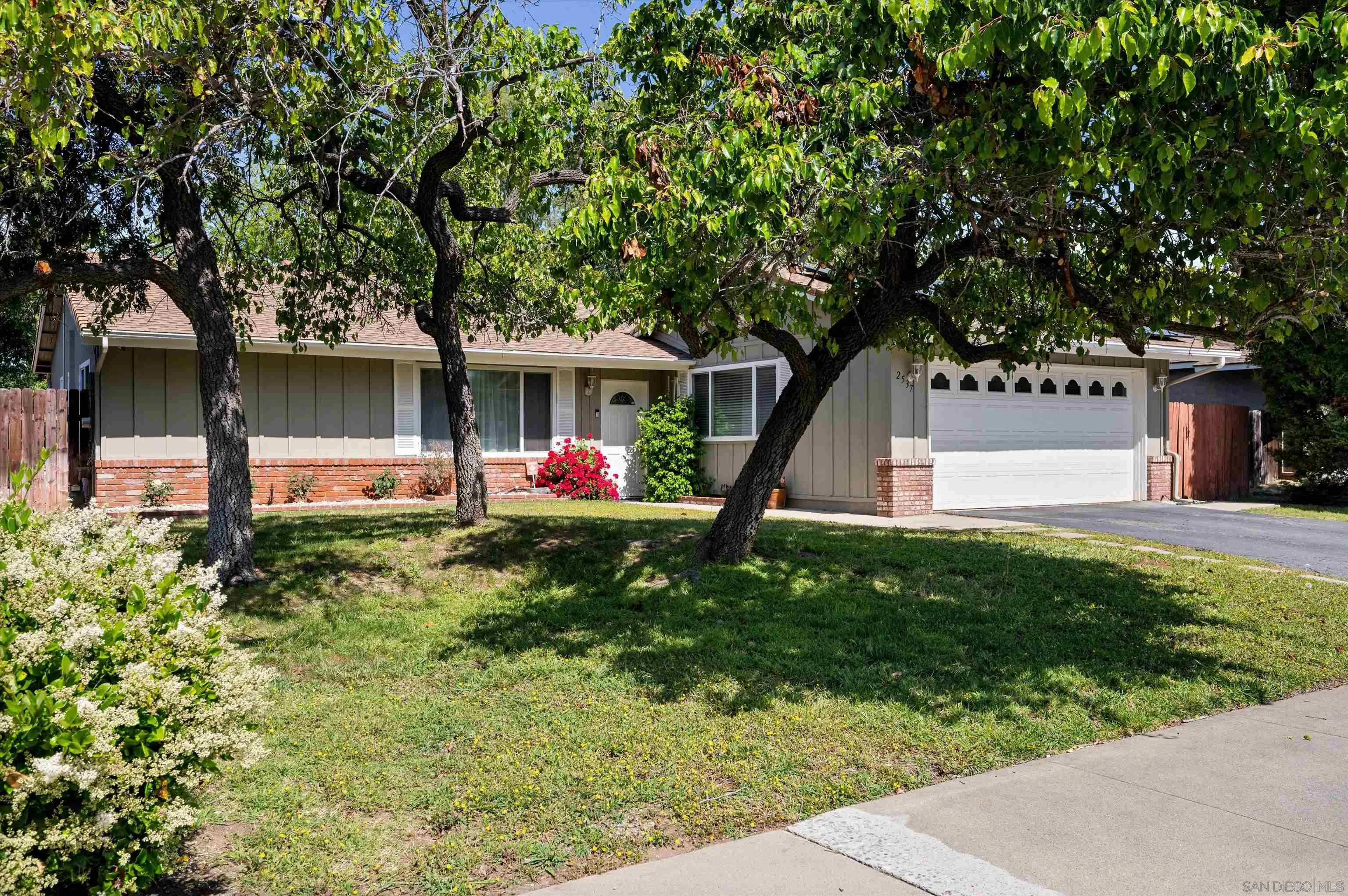 2537 Buena Rosa Fallbrook, CA 92028 - Photo 2 of 20 a front view of a house with garden