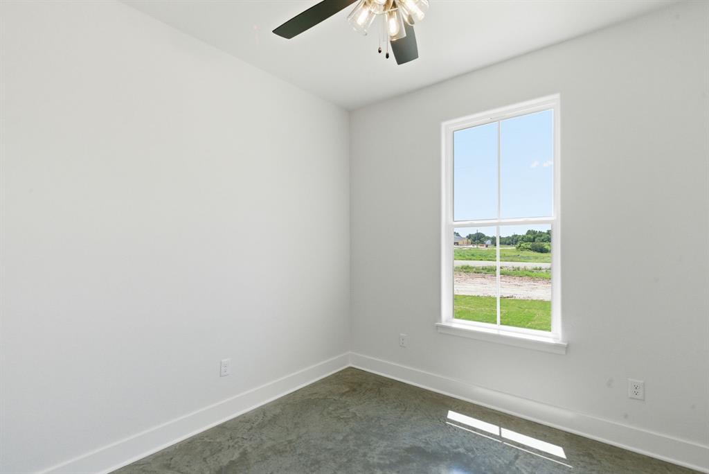 109 Graystone Weatherford, TX 76088 - Photo 21 of 26 an empty room with a window
