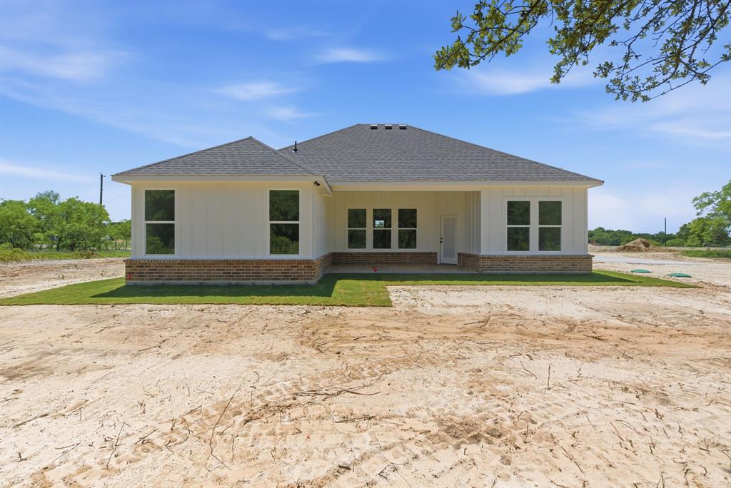 109 Graystone Weatherford, TX 76088 - Photo 26 of 26 a front view of a house with a yard