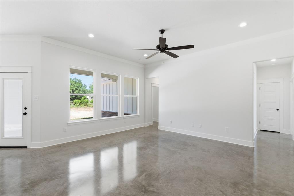 109 Graystone Weatherford, TX 76088 - Photo 9 of 26 a view of an empty room with a window
