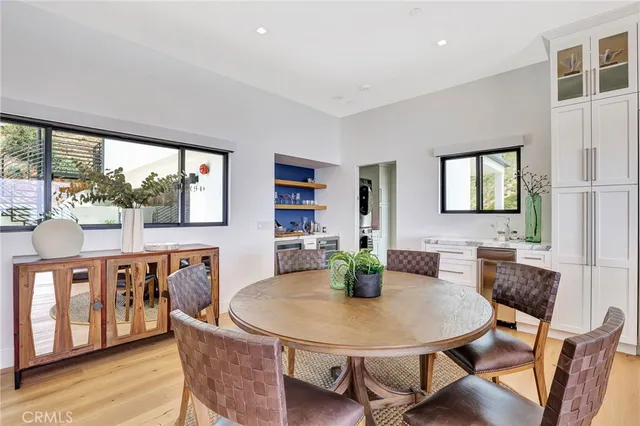a view of living room with granite countertop furniture and a flat screen tv