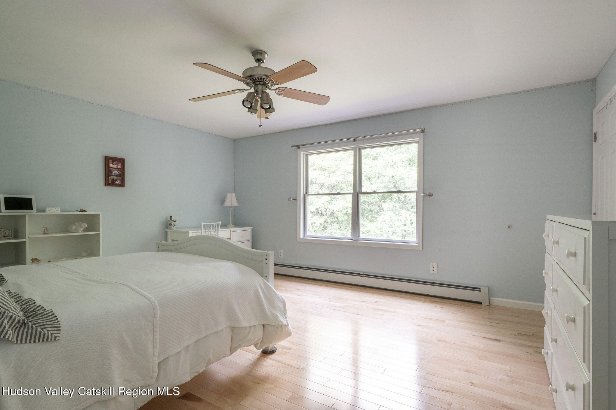 214 Wright Road Kerhonkson, NY 12446 - Photo 27 of 50 a bedroom with a large bed and a window