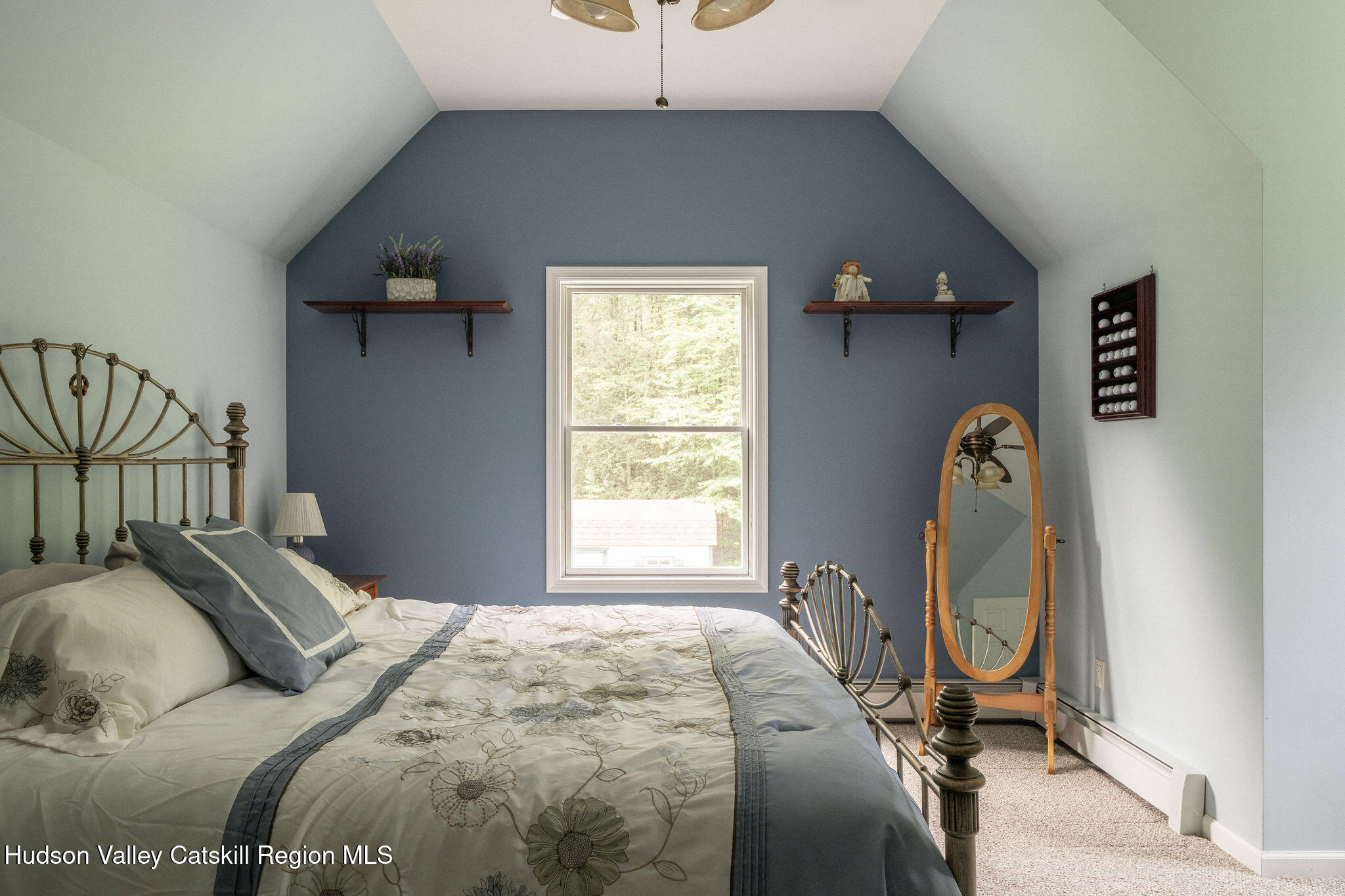 214 Wright Road Kerhonkson, NY 12446 - Photo 29 of 50 a bedroom with a bed and a chandelier
