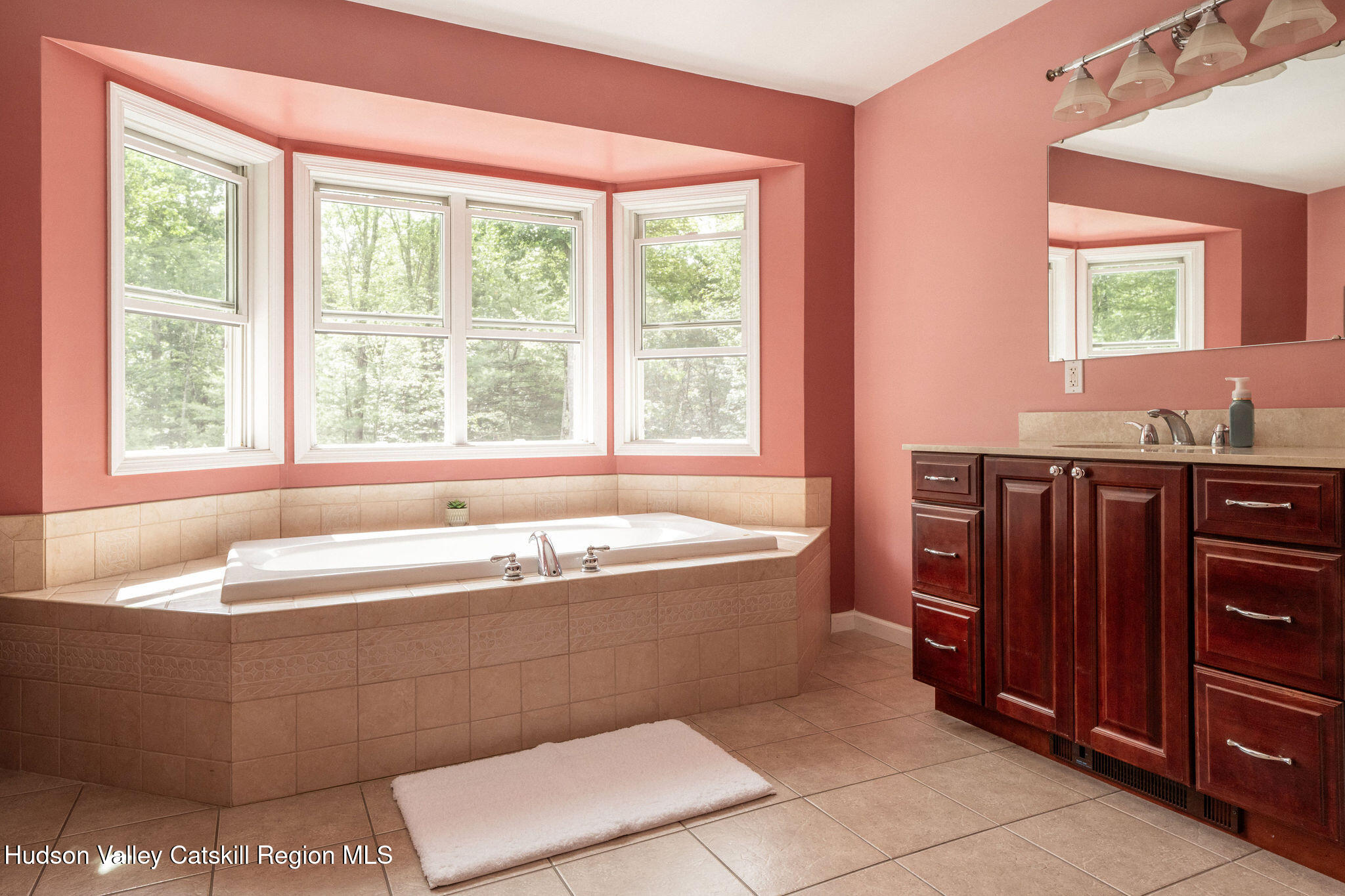 214 Wright Road Kerhonkson, NY 12446 - Photo 35 of 50 a bath tub sitting in a bathroom next to a window
