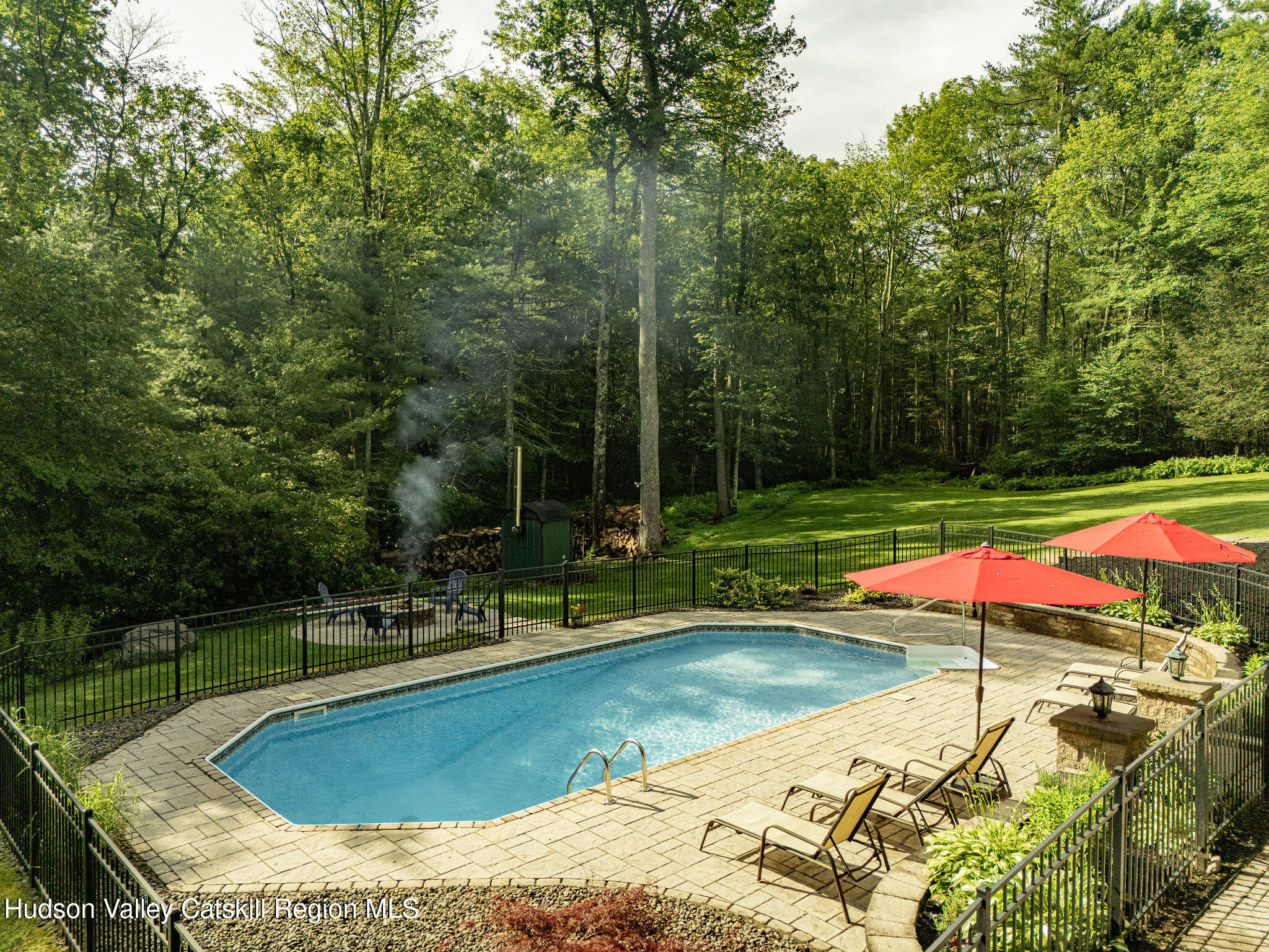 214 Wright Road Kerhonkson, NY 12446 - Photo 6 of 50 a view of a swimming pool with lounge chairs
