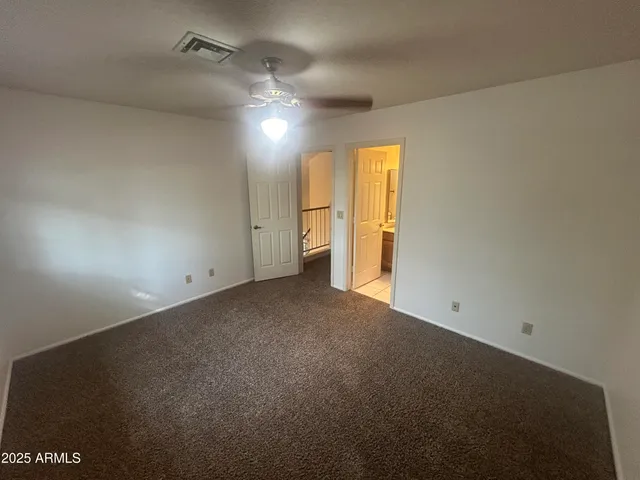 a bathroom with a double vanity sink and mirror