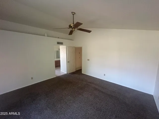 a view of a porch and garden