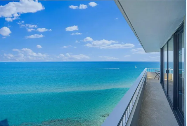a view of residential houses with outdoor space