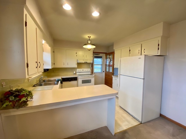 3871 Shutterlee Mill Road Staunton, VA 24401 - Photo 10 of 28 a large kitchen with a refrigerator a stove a sink dishwasher and a refrigerator with wooden floor